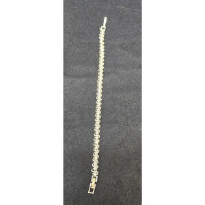 BMNY 14kgp VTG Signed s-design tennis bracelet CZ Silver Tone w/ White Stones